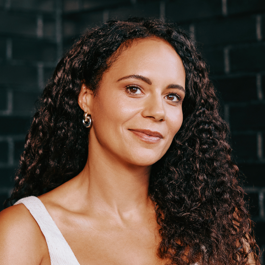 Sculpt & Lift patient portrait with dark curly hair