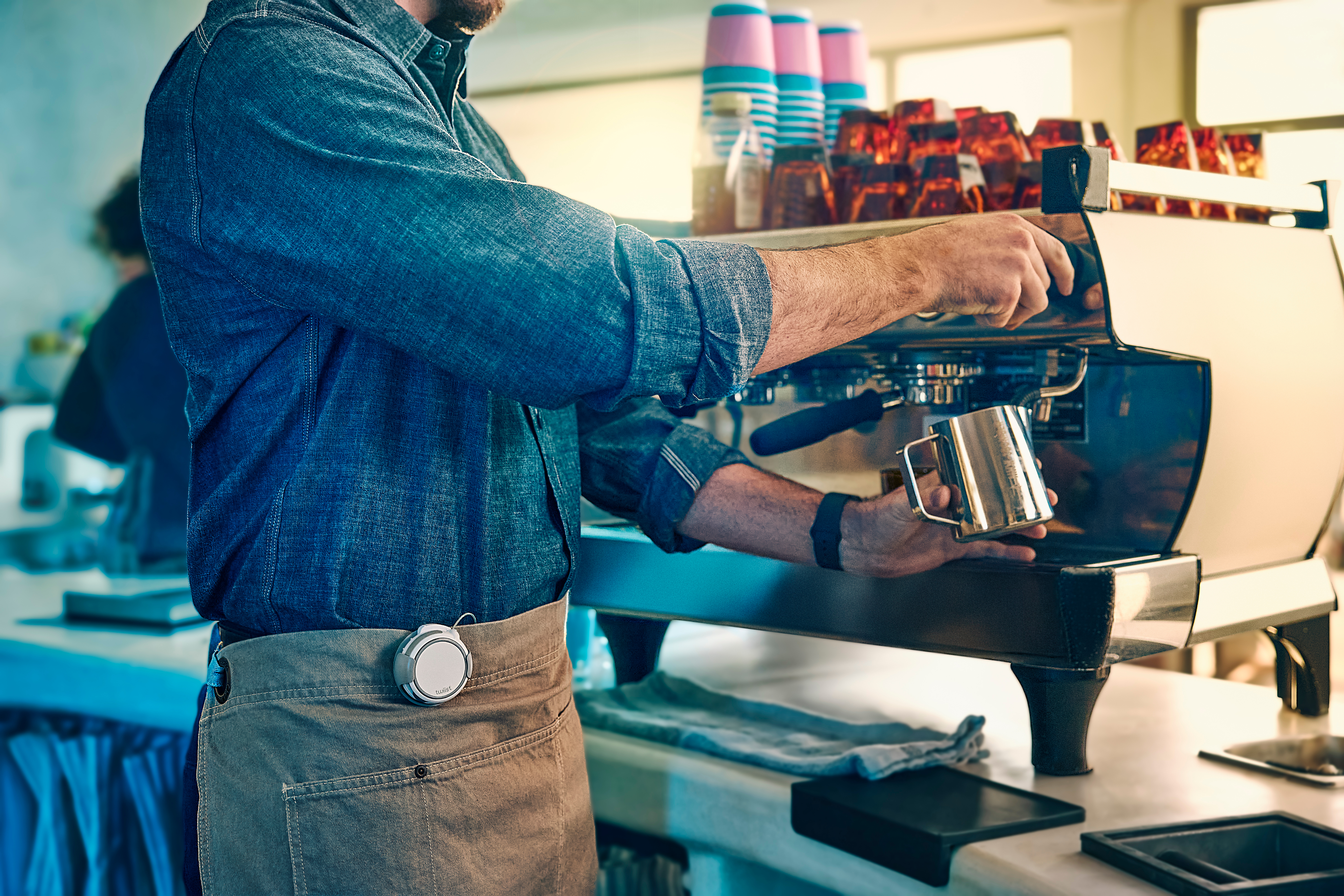 twiist campaign photograph of a barista preparing coffee